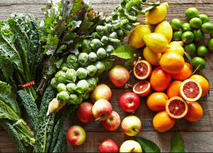 a group of fruits and vegetables on a wood surface Healthy Weight Loss Diets Merry Hill